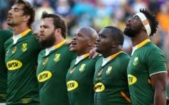 South Africa's captain Siya Kolisi (R)