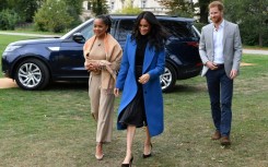 Prince Harry photographed with his wife Meghan and her mother Doria Ragland