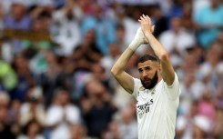 Karim Benzema applauds as he is substituted during his final appearance for Real Madrid