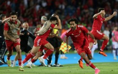 Al Ahly players celebrate winning the CAF Champions League in Casablanca on Sunday.