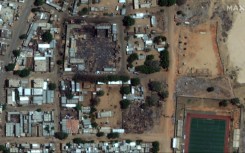 A satellite photo shows the burned-out market area of El Geneina in Sudan's West Darfur state