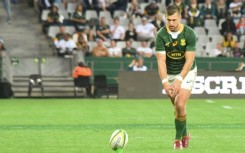 Handre Pollard kicks a penalty for South Africa against Wales during a 2022 Test in Cape Town.
