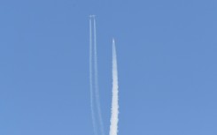 The Virgin Galactic SpaceShipTwo space plane Unity and mothership separate as they fly way above Spaceport America in New Mexico on July 11, 2021