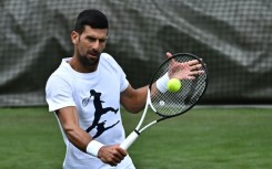 'Hungry' man: Novak Djokovic trains at Wimbledon