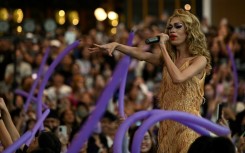 Taylor Sheesh, a Philippine drag queen, impersonating Taylor Swift in a packed Manila mall