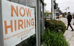 The rate of hiring slowed in the United States last month while wage growth accelerated