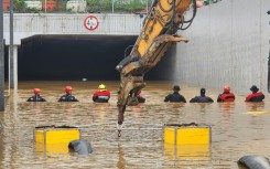 Rescue workers were struggling to reach more than 10 cars trapped in a 430-metre underground tunnel in Cheongju, North Chungcheong province