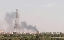 Smoke billows from Khartoum's battle-scarred sister city of Omdurman