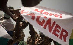 Malian demonstrators hold up a banner reading 'Thank you, Wagner' in February 2022. Mali's junta brought in Russian paramilitaries to support the army in the fight against jihadists