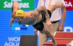 Australia's Kyle Chalmers is looking to beat Romania's David Popovici for the men's 100m freestyle title at swimming's world championships in Fukuoka