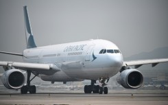 File: A Cathay Pacific plane. AFP/Anthony Wallace