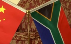 File: China and South Africa's respective national flags. (eNCA\Screenshot)