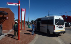 File: A minibus taxi seen at a taxi rank in Wallacedene. AFP/Rodger Bosch