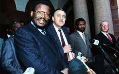 (From L to R) Kwa-Zulu president of Inkatha movement who represents the Zulu's Mangosuthu Buthelezi, Pik Botha, Minister of Foreign affairs, General Bantu Holomisa, leader of nominaly independant Transkei who represents the Xhosas and Adrian Vlok, Minister of Police held talks on August 21, 1990 on ways of ending the township killings. (Photo by Trevor SAMSON / AFP)