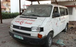 A damaged ambulance is grounded at Ahli Arab hospital in central Gaza following a blast which ripped through it a day earlier killing hundreds. AFP/Dawood Nemer