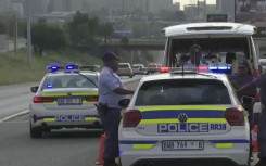 Police officers patrolling the M1 in Johannesburg. 