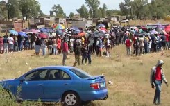 Property owners have been locked in a standoff with alleged land invaders.