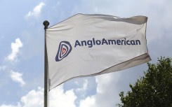 A flag flies outside the offices of Anglo American Plc in the Marshalltown district of Johannesburg. Chris Ratcliffe/Bloomberg via Getty Images