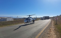 A police helicopter on the ground.