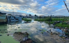 Bloekombos residents in Kraaifontein are demanding a more permanent solution be implemented to address frequent flooding in their homes. eNCA/Kevin Brandt