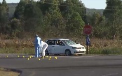 Crime scene investigators processing a scene of a police shootout in Harding, KZN