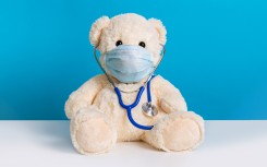 File: Teddy bear doctor with protective medical mask and stethoscope. Getty Images/Julia Lavrinenko.