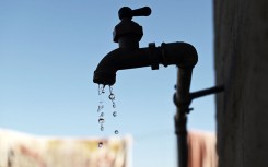 File: Water dripping from a tap.  Leon Sadiki/Bloomberg via Getty Images