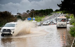 File: A flooded road surface. Jaco Marais/Die Burger/Gallo Images via Getty Images