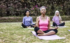 File: Women taking part in a yoga class. Getty Images/MoMo Productions