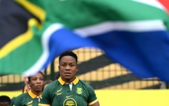 Babalwa Latsha of South Africa leads the team out prior to the WXV 2 2023 match between Italy and South Africa at Athlone Sports Stadium. Johan Rynners/World Rugby via Getty Images