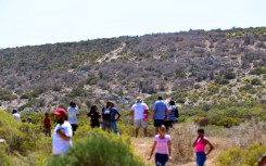 Members of the community search for Joslin Smith in the woods in Diazville. Theo Jeptha/Die Burger/ Gallo Images via Getty Images