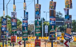 Campaign posters for political parties competing in the national election. Waldo Swiegers/Bloomberg via Getty Images