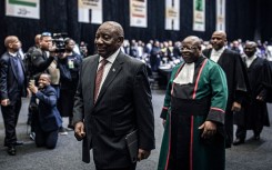 President Cyril Ramaphosa walks out from the Parliament after he was elected President of South Africa. Per-Anders Pettersson/Getty Images