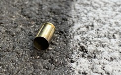 File: A bullet casing at a crime scene. GettyImages/christelista