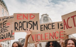 File: People marching against racism. GettyImages/FilippoBacci