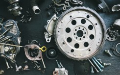 File: Car parts displayed on a workbench. GettyImages/urbancow