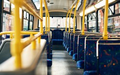 File: Seats on an empty bus. GettyImages/PeopleImages