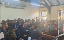 95 arrested Libyan nationals appear in court. 