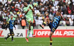 Taahir Goedeman of Cape Town City gets to the ball ahead of Thalente Mbatha of Orlando Pirates during the DStv Premiership 2023/24 Game at Cape Town Stadium 