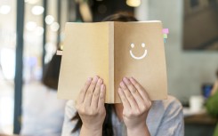 File: A person reading a book. GettyImages/yipengge