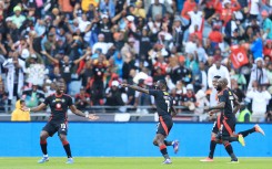 Deon Hotto of Orlando Pirates celebrates a goal with his teammates. BackpagePix/Samuel Shivambu