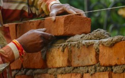 File: A construction worker on a building site. GettyImages/anand purohit