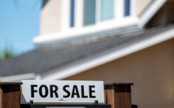 File: A "For Sale" sign in front of a home. David Paul Morris/Bloomberg via Getty Images