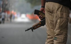 File: An Indian policeman stands alert. Faisal Khan/NurPhoto via Getty Images