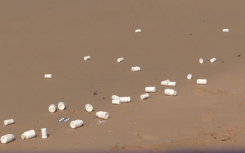 Some of the pill bottles that washed up on the beach. eNCA