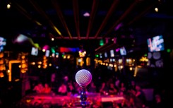 File: A microphone seen at a comedy show. GettyImages/7713Photography