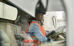 File: A female truck driver. GettyImages/xavierarnau