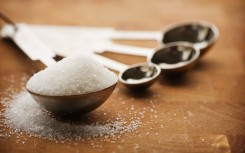 File: Tablespoon filled with granulated sugar. GettyImages/knape