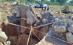 Police officers seen at the Stilfontein mine. eNCA/Bafedile Moerane