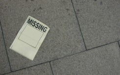 File: A poster for a missing person. GettyImages/ijoe84